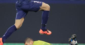 PHOTOS: Valdes's heroics help Barca claim Super Cup