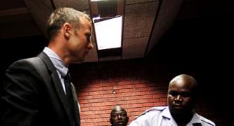 PHOTOS: Pistorius sobs as court hears murder charge
