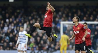 EPL Photos: United beat QPR as title comes into focus