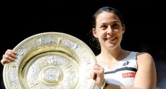 PHOTOS: Bartoli ends her major drought in the 47th attempt
