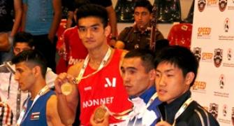 Shiva wins split decision for gold at Asian boxing