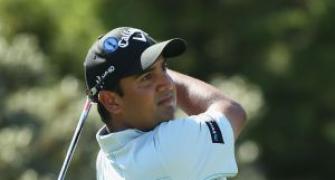 Johnson leads at British Open, India's Kapur tied fourth