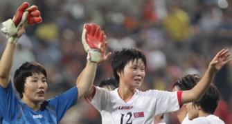 North Koreans get warm reception in South, win match