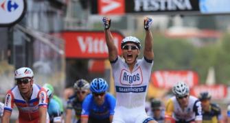 Contador down as Kittel wins chaotic Tour start