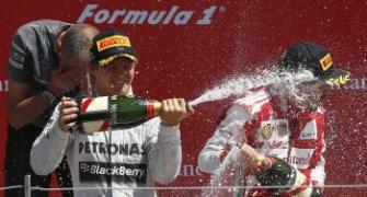 Rosberg triumphs in Britain after Vettel retires