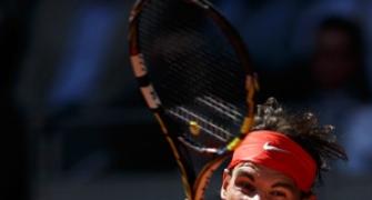 Murray exits, Nadal battles past Ferrer in Madrid