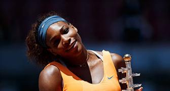 Serena overpowers Sharapova in Madrid, claims 50th title