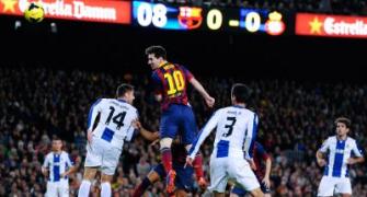 Messi draws another blank but Barca win derby