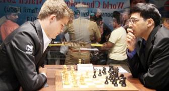 World chess: Anand plays out tame draw with white pieces against Carlsen