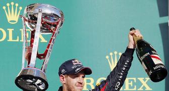 PHOTOS: Vettel vrooms to record with U.S. Grand Prix win