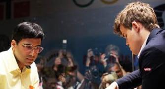 Carlsen in sight of World crown after beating Anand in Game 9
