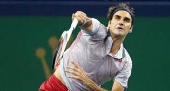 Djokovic canters as Federer makes winning return
