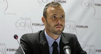 Cop heading Pistorius's girlfriend's murder case quits