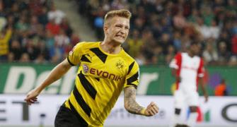 Bundesliga: Reus sparkles as Dortmund beat Augsburg 3-2