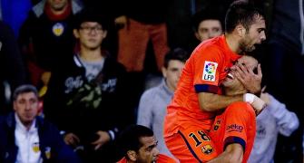 Valencia vow to banish fan who threw bottle at Messi