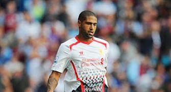 Liverpool's Johnson out for a month with groin injury