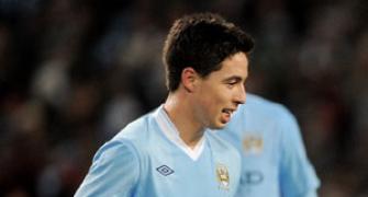 Man City's Samir Nasri out for eight weeks with knee injury