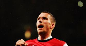 FA Cup: Podolski double helps Arsenal rout Coventry City