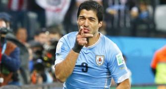After biting ban...Suarez returns to Uruguay