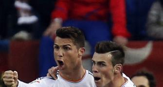 La Liga race tightens after Madrid derby draw, Barcelona win