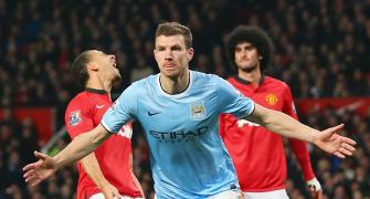 EPL PHOTOS: Manchester City embarrass United; Arsenal held