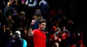 Old master Federer tames Nishikori at Tour Finals