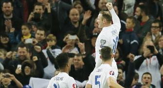 Euro qualifiers: Rooney scores in 100th match as England rally; Spain win