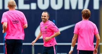 Iniesta out of Barca's Champions League game
