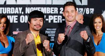 Boxer Pacquiao roughs up sparring partners before Algieri bout