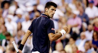 US Open: Djokovic wears down Murray to reach last four
