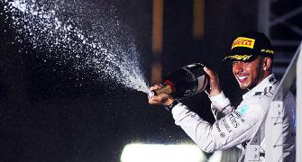 Singapore GP: Hamilton wins to take lead after Rosberg retires