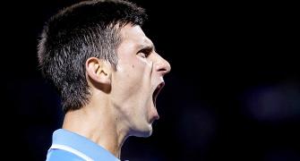 Miami Open: Djokovic digs deep to face Isner in semis