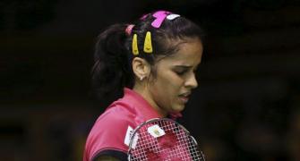 Saina knocked out of Malaysia Open, loses top ranking