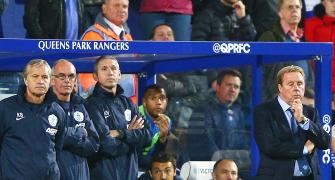 Wounded Redknapp leaves QPR but not quitting football