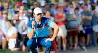 McIlroy and former agents settle legal case