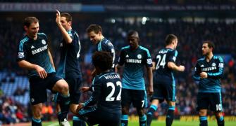 Chelsea go seven points clear as City held by Hull