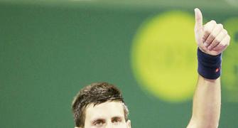 Djokovic eases past compatriot in Doha