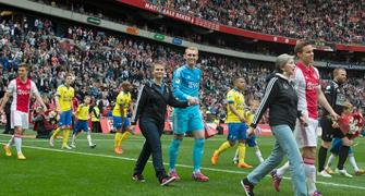 How Sweet! Ajax players get walked onto pitch by their mothers!