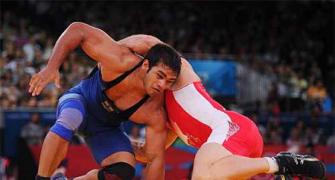 Wrestler Narsingh wins bronze at Worlds, books Olympic berth