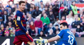 La Liga: Messi treble lifts Barca to the top of table