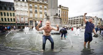 Ecstatic England fans party in Lille after winning 'Battle of Britain'