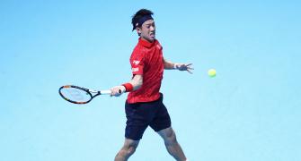 ATP Tour Finals: Nishikori thrashes wayward Wawrinka