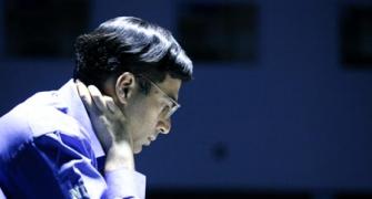 Vishy Anand stays third after playing out an easy draw