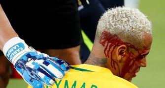 Neymar left bloodied in Brazil's thumping win; Argentina held