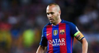 Injured Iniesta faces long spell out for Barcelona