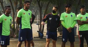 After Lankan cricketers, ISL footballers sport masks in Delhi