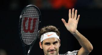 PHOTOS: Federer makes winning return at Australian Open