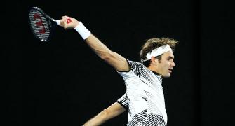 PHOTOS: Vintage Federer hammers Berdych to reach Aus Open last 16