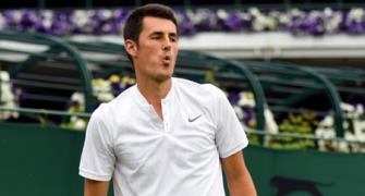 'I was bored,' Tomic says after first-round defeat at Wimbledon