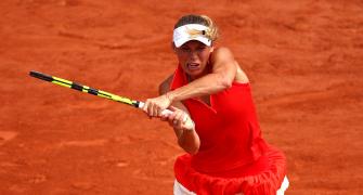 French Open PHOTOS: Wozniacki survives scare, Muguruza advances